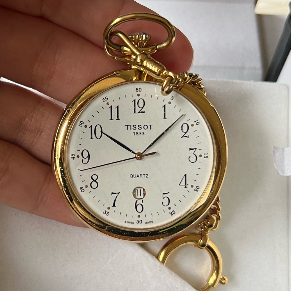 EUC TISSOT POCKET WATCH. CASE AND DUST BAG INCLUDED.